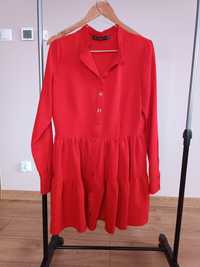 Czerwona sukienka rozkloszowana by Mielczarkowski