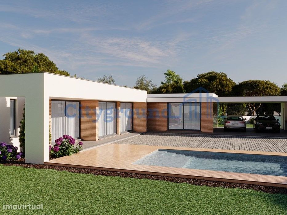 Moradia V3 térrea com garagem e vista campo