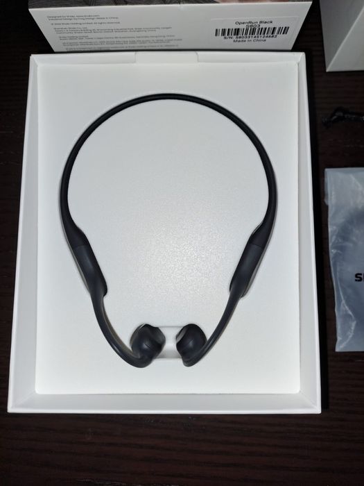 Auriculares OpenRun Shokz como novo