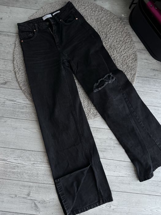 Чорні штани палаццо з розрізами внизу стан новий с