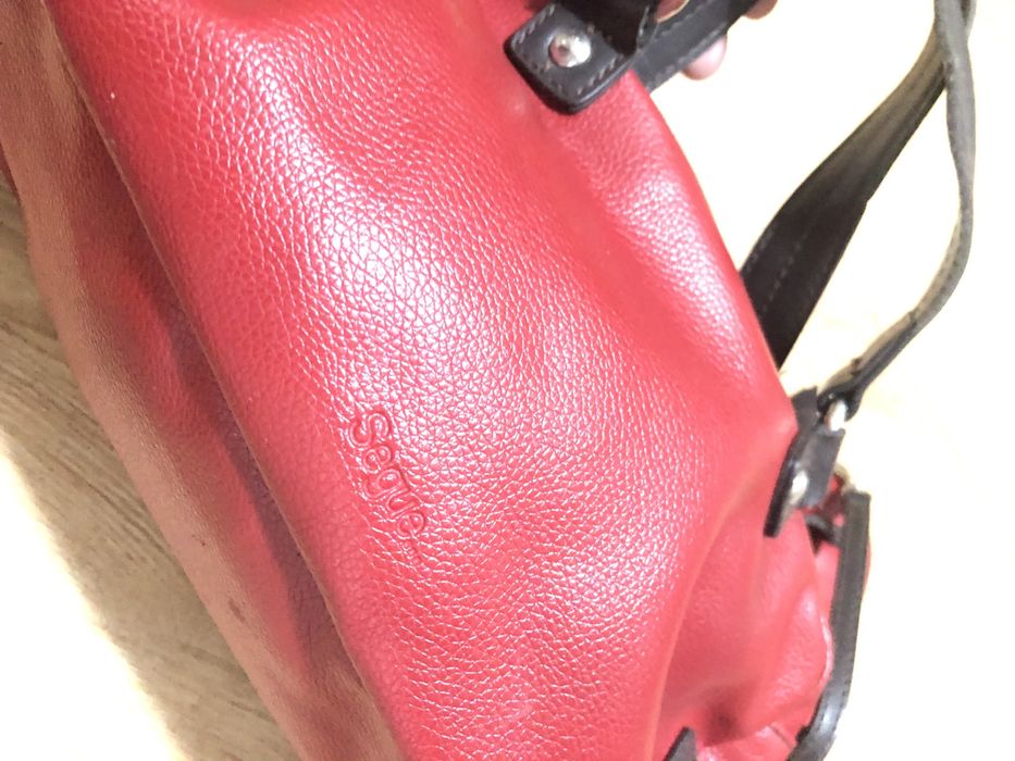 Carteira pequena vermelho e castanho escuro Segue…