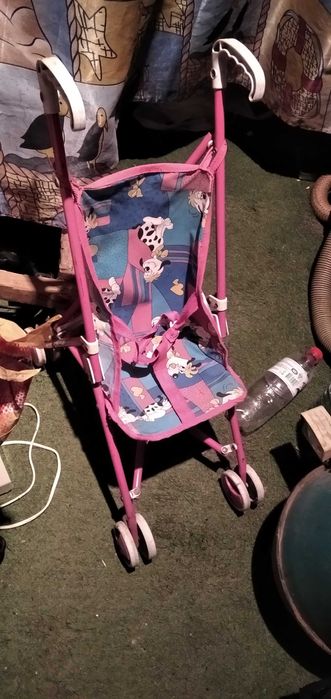 Детская игрушечная коляска