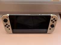Nintendo Switch OLED + 6 gier + pokrowiec | Pokémon, Mario, FIFA