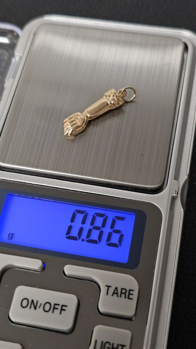 Figa pendente ouro 19,2k (preço fixo)