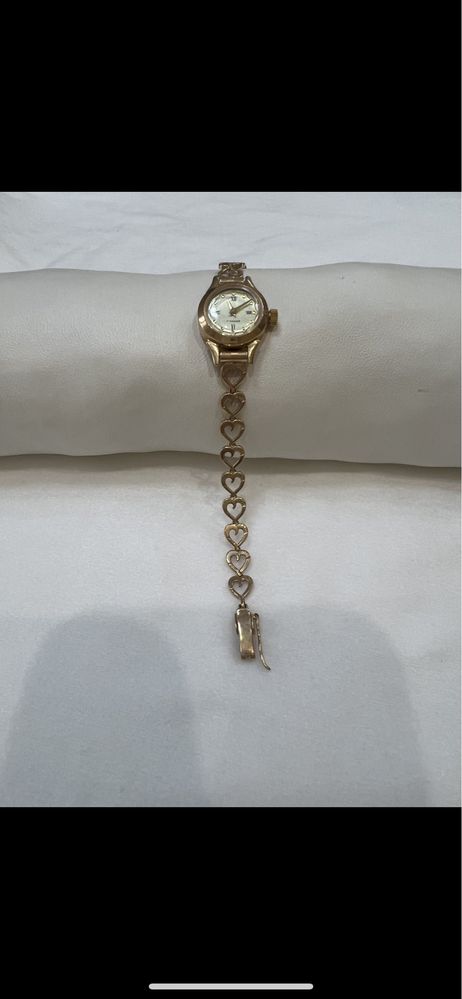 Золотий жіночий годинник розпродаж
