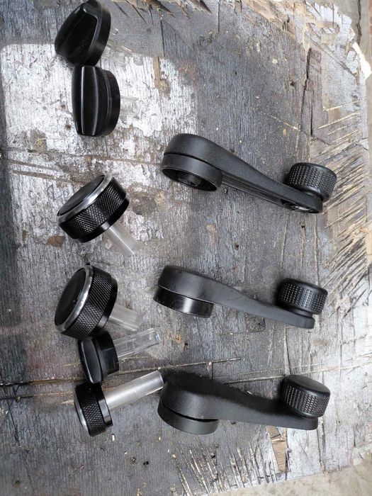 Ручки склопідйомника та обігрівача салону