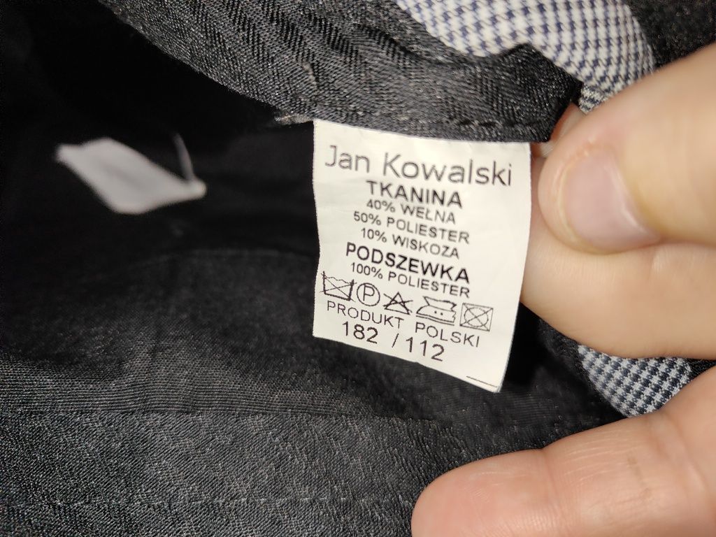 Nowy męski garnitur Jan Kowalski i dodatkowo drugie spodnie.