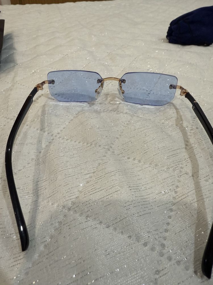 Oculos de sol.