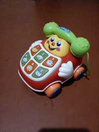 Веселый детский телефон "HELLO" на моторчике.