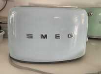Torradeira smeg azul avariada para oeças