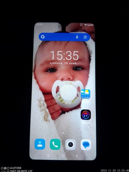 Продам телефон .