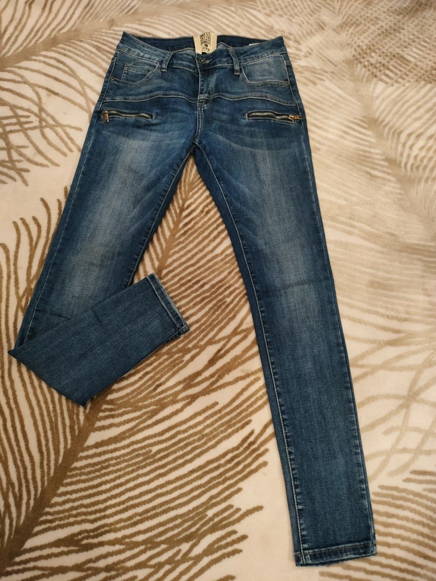 Damskie spodnie jeans rozm 40 L