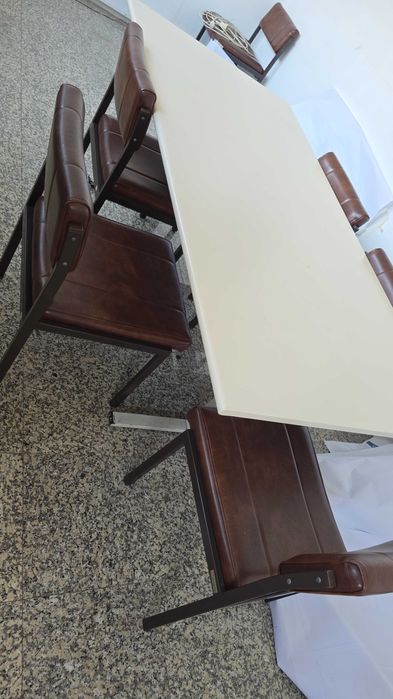 Cadeiras almofadadas