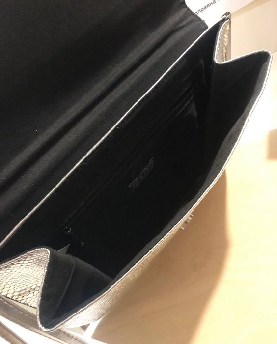 Новый серебристый клатч.Сумка.