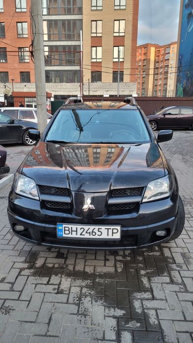 Mitsubishi Outlander 2.4 avtomat gaz обмен на электричку