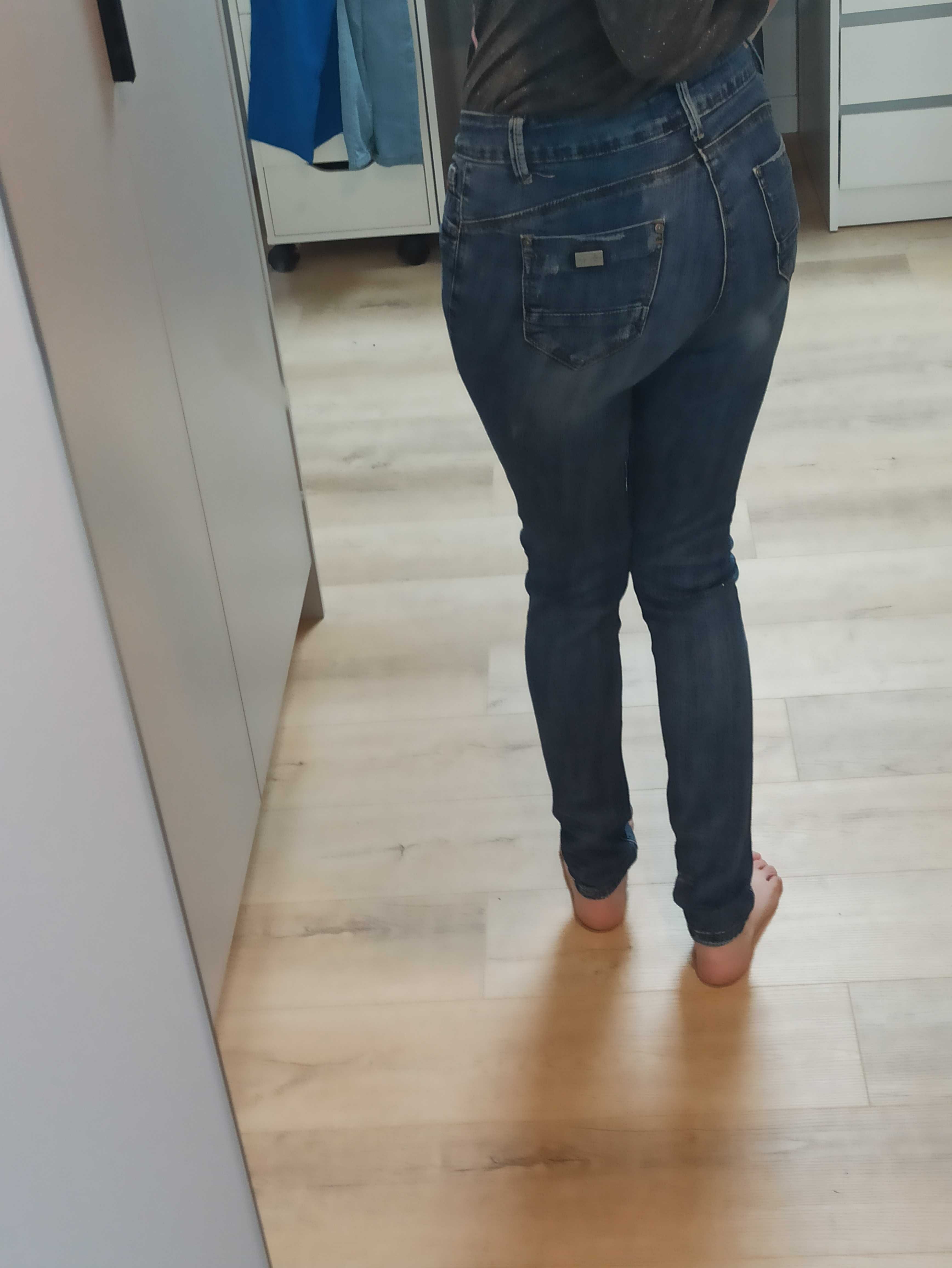 Spodnie skinny z przetarciami rozmiar 27