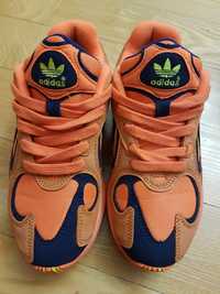 Кроссовки оранжевые.