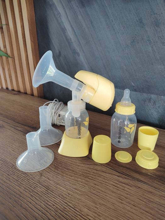 Laktator elektryczny Medela Mini + lejki + butelka