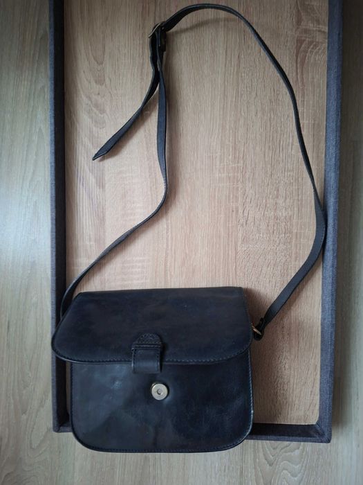 Mala em pele para senhora