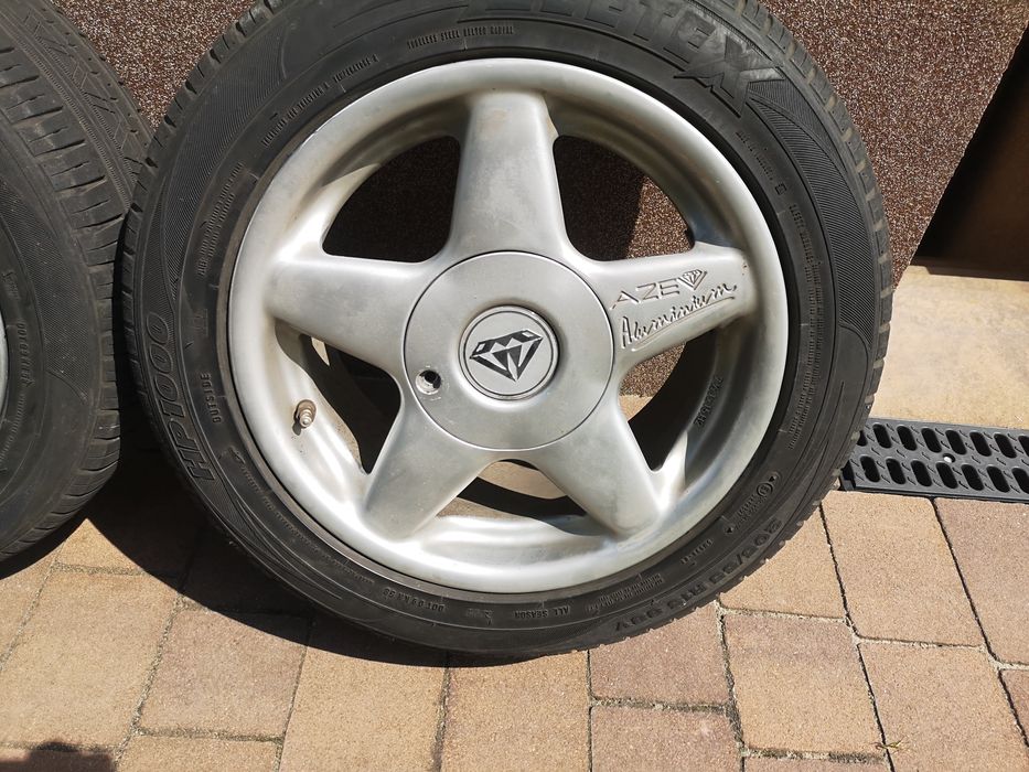 4x felga aluminiowa 15" 4x114.3 ET40 plus opony wielosezonowe