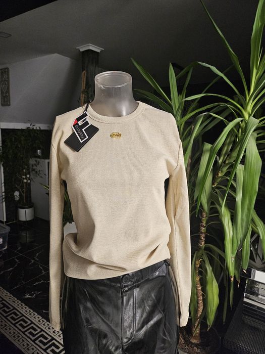 Piękna zlota bluzeczka Prada.