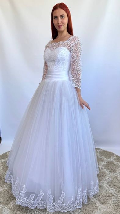 Продам весільні сукні нові