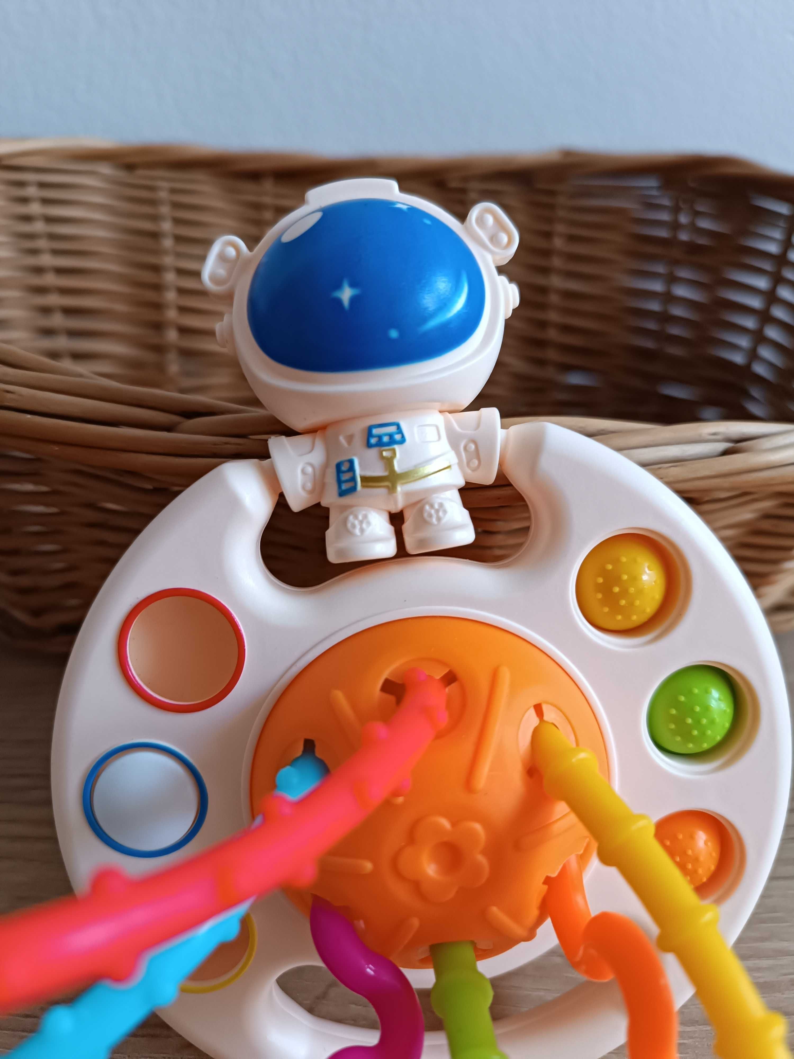 Zabawka sensoryczna kosmonauta gryzak