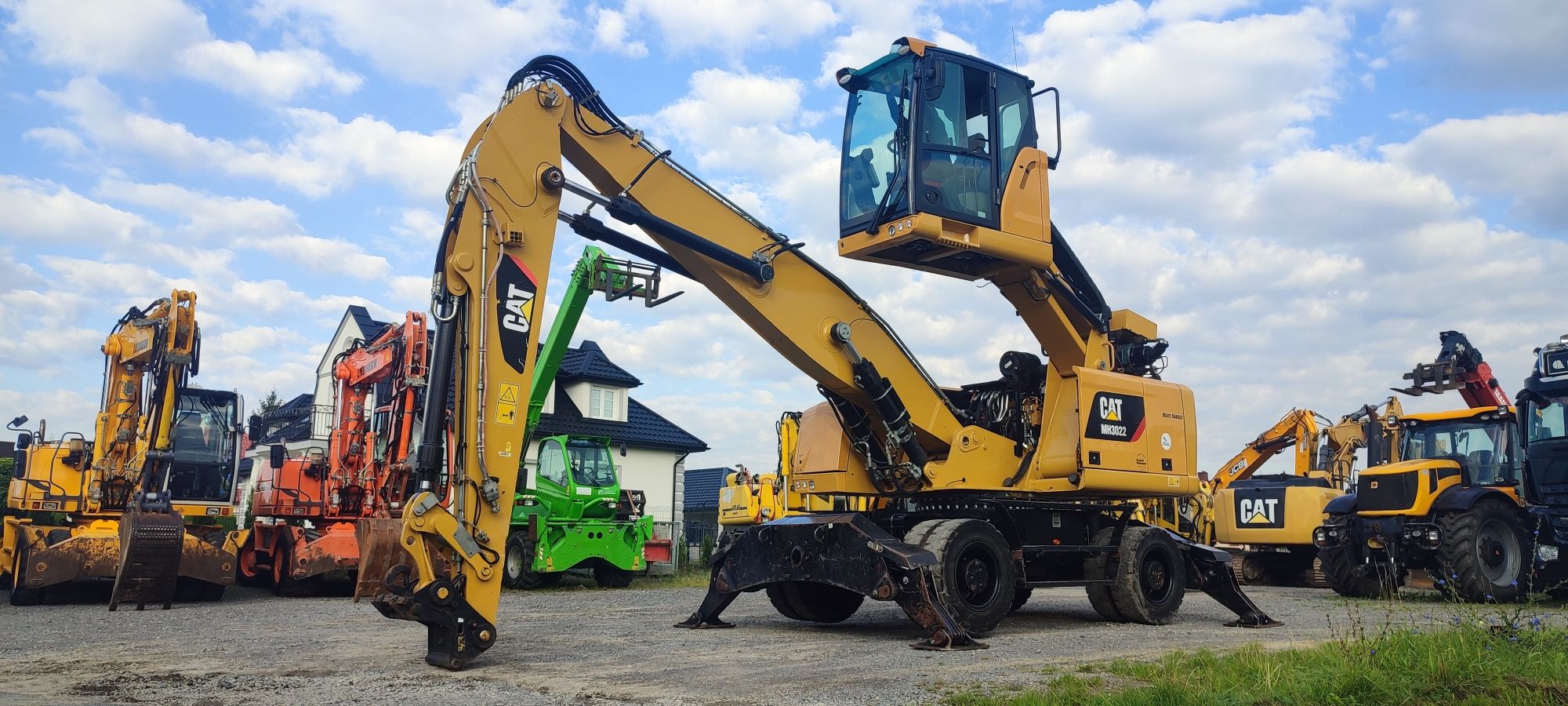 Koparka przeladunkowa CAT MH 3022 koparka do złomu fusch liebherr cat