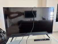TV TCL em bom estado
