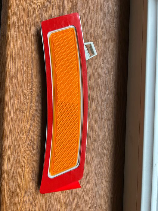 Помаранчевий катафот / відбивач у передній бампер bmw X5 E70