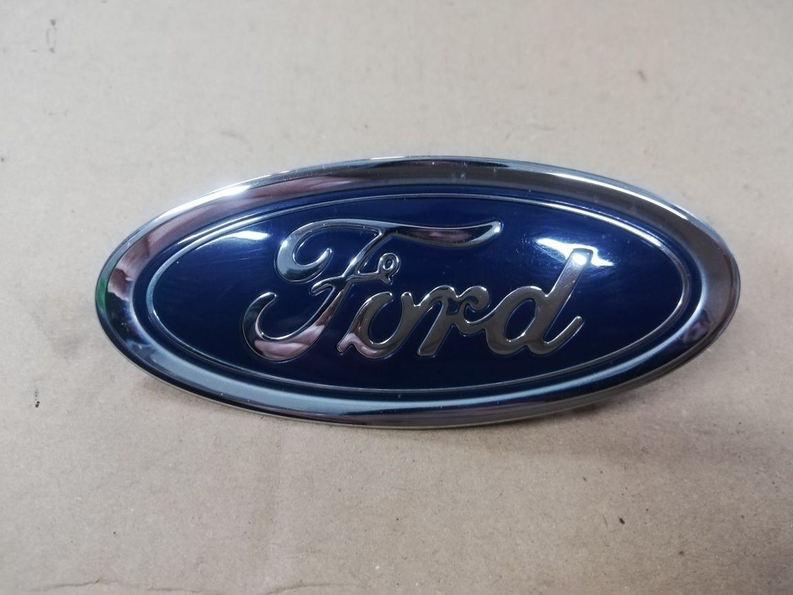 Emblemat znaczek logo zderzaka przedniego przód Ford Focus mk4 IV oryg