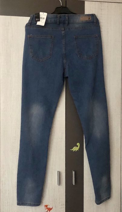 Modne Spodnie jeans dziury r.9 fashionova