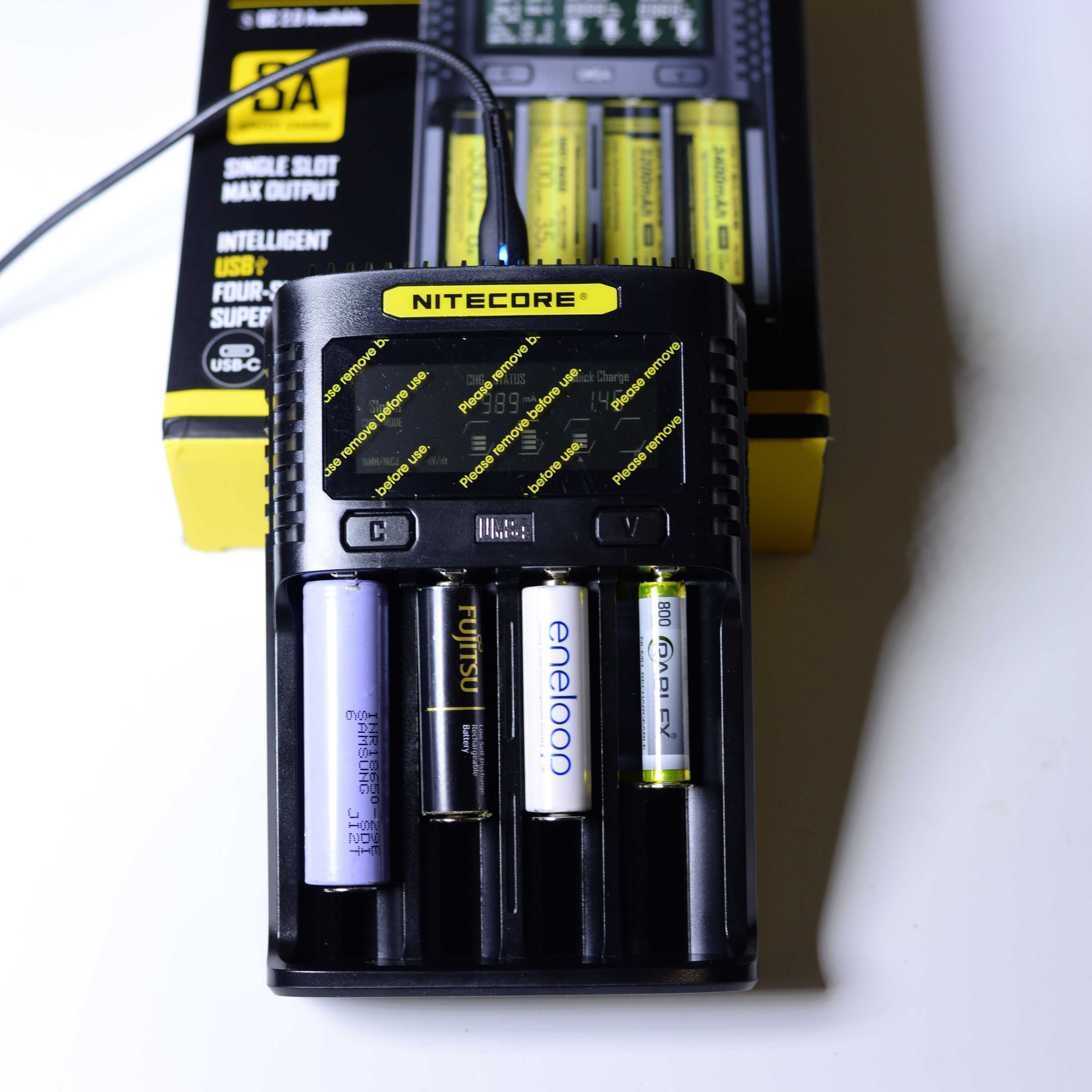 Зарядний пристрій чотирканалий Nitecore UMS4 Li-ion Ni-MH/Ni-Cd новий