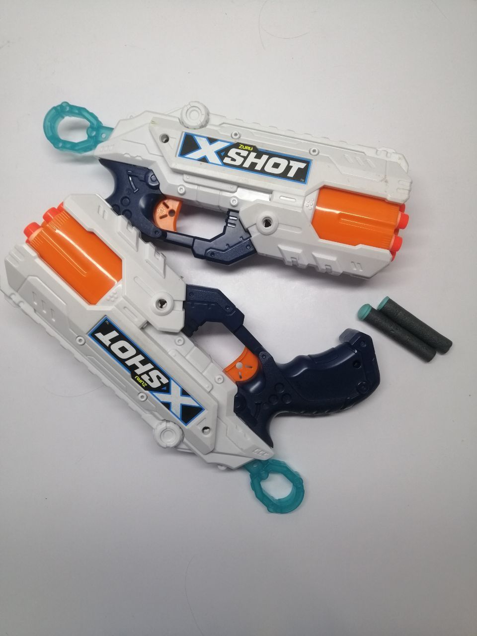 Іграшкові пістолети "X-shot".