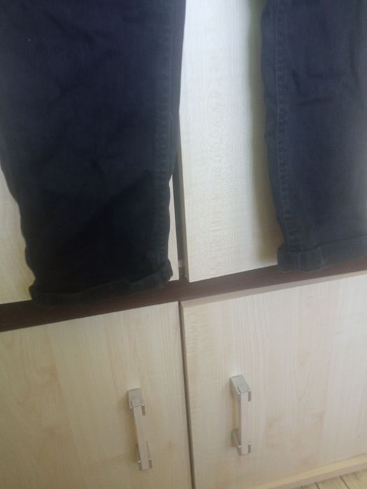 Spodnie jeansowe damskie na szelkach