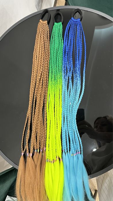 Штучні хвостики- косички