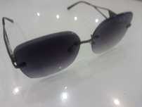 Okulary przeciwsłoneczne PRADA Milano - Unisex