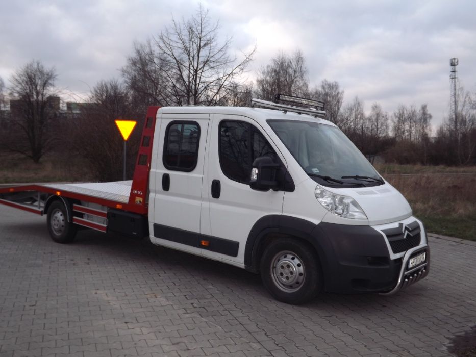 POMOC DROGOWA auto laweta autoholowanie transport aut