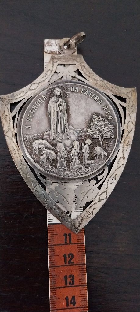 Medalha antiga em prata