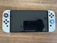 Nintedno Switch OLED + gry + Ring fit