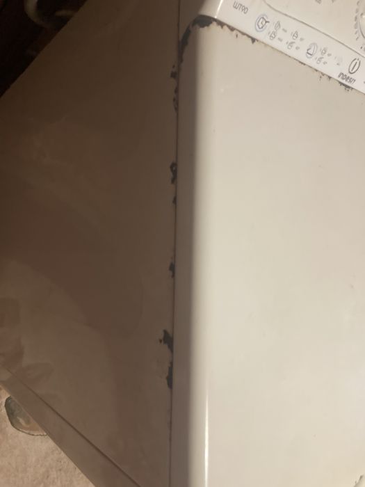 Пральна машина Indesit wt90 з вертикальною загрузкою