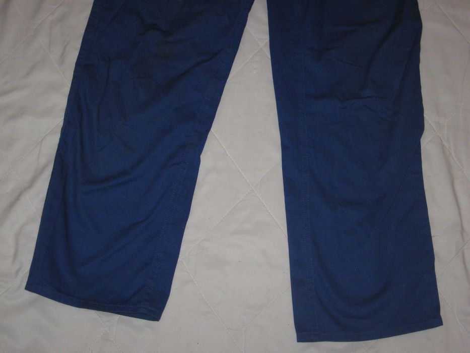 spodnie Uvex robocze niebieskie proste 48 4 kieszenie bawełna