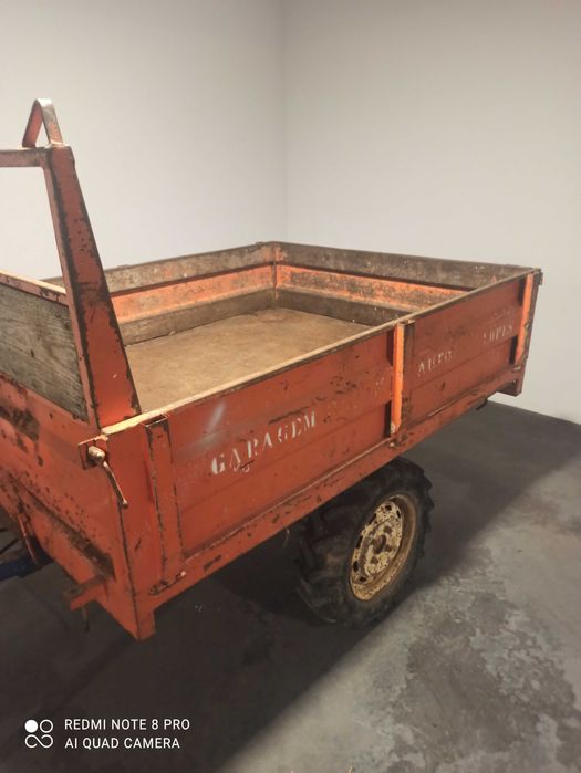 Reboque motocultivador basculante