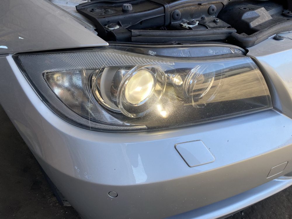 EUROPA Lampa kompletna prawa lewa xenon skretny Ahl BMW e90