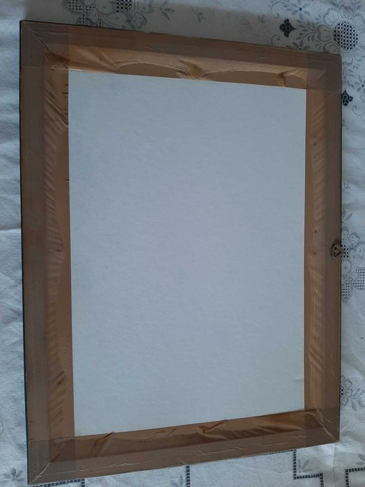 Espelho com moldura em madeira teca