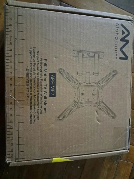 Кріплення для телевізора на стіну