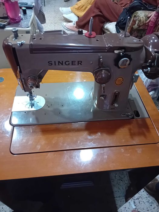 Maquina de  costura marca singer