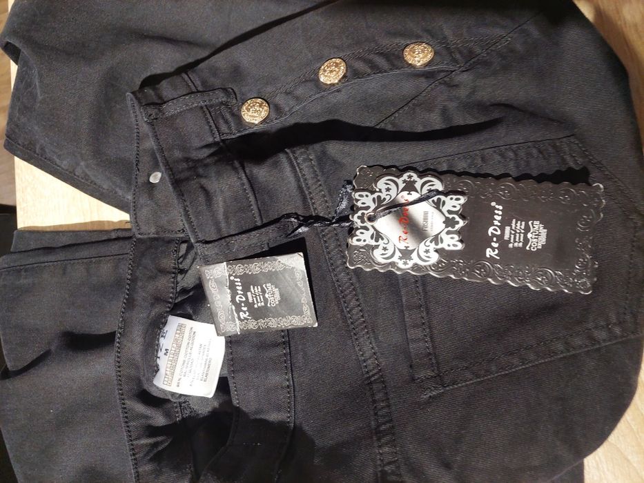 Nowe spodnie czarne jeansy z guzikami M 38