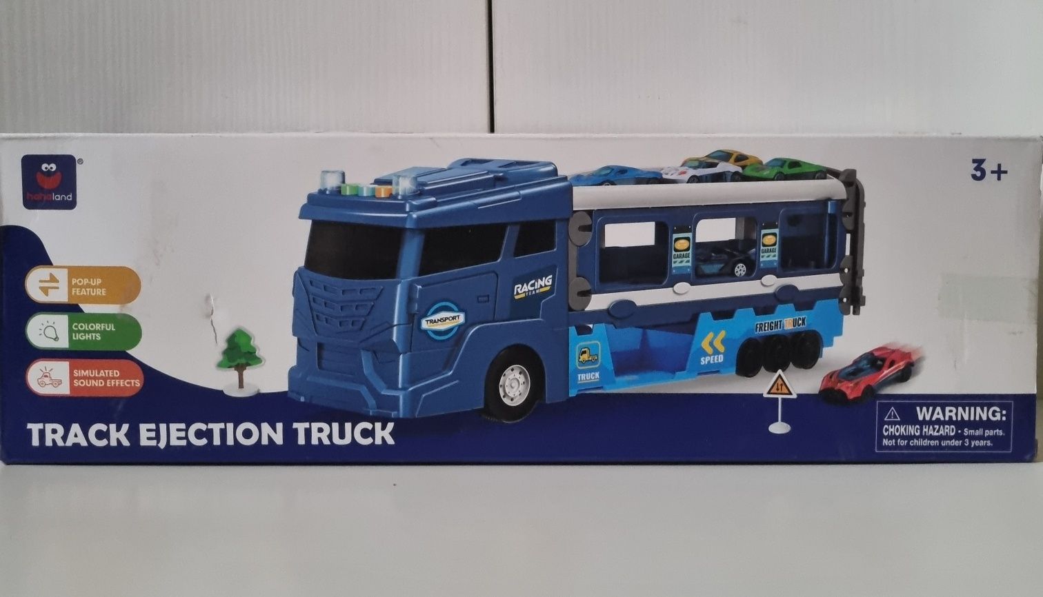 Ciężarówka-transporter autek z torem