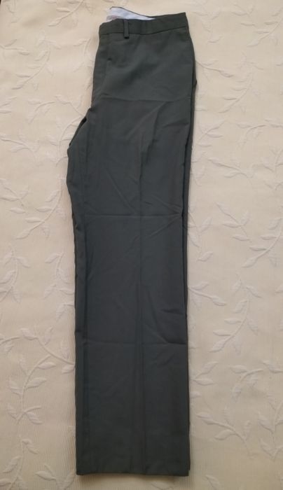 Calças Emidio Tucci, marcas de uso nas fotografias